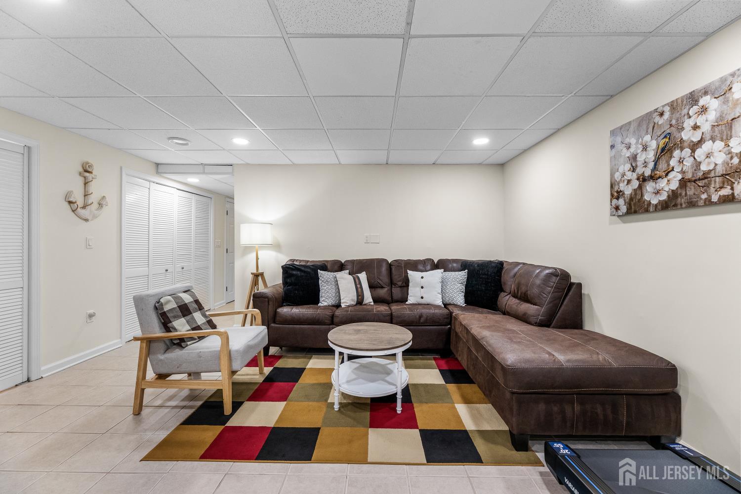 7 Edith Drive Somerset, NJ 08873 - Photo 27 of 49 a living room with furniture and a rug