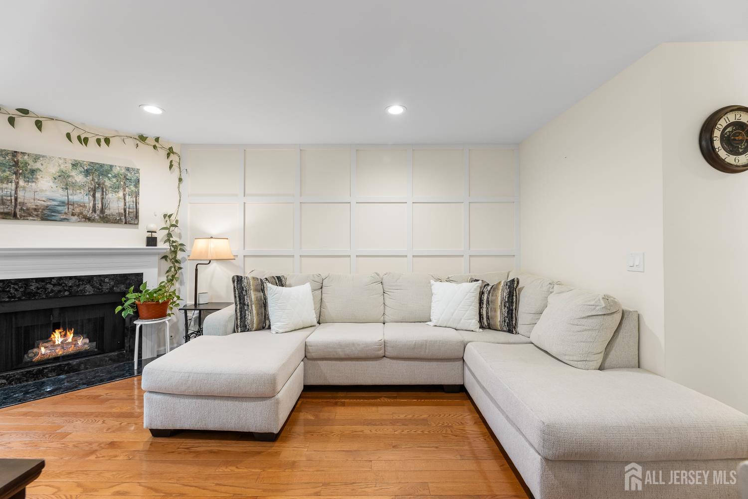 7 Edith Drive Somerset, NJ 08873 - Photo 3 of 49 a living room with furniture and a fireplace