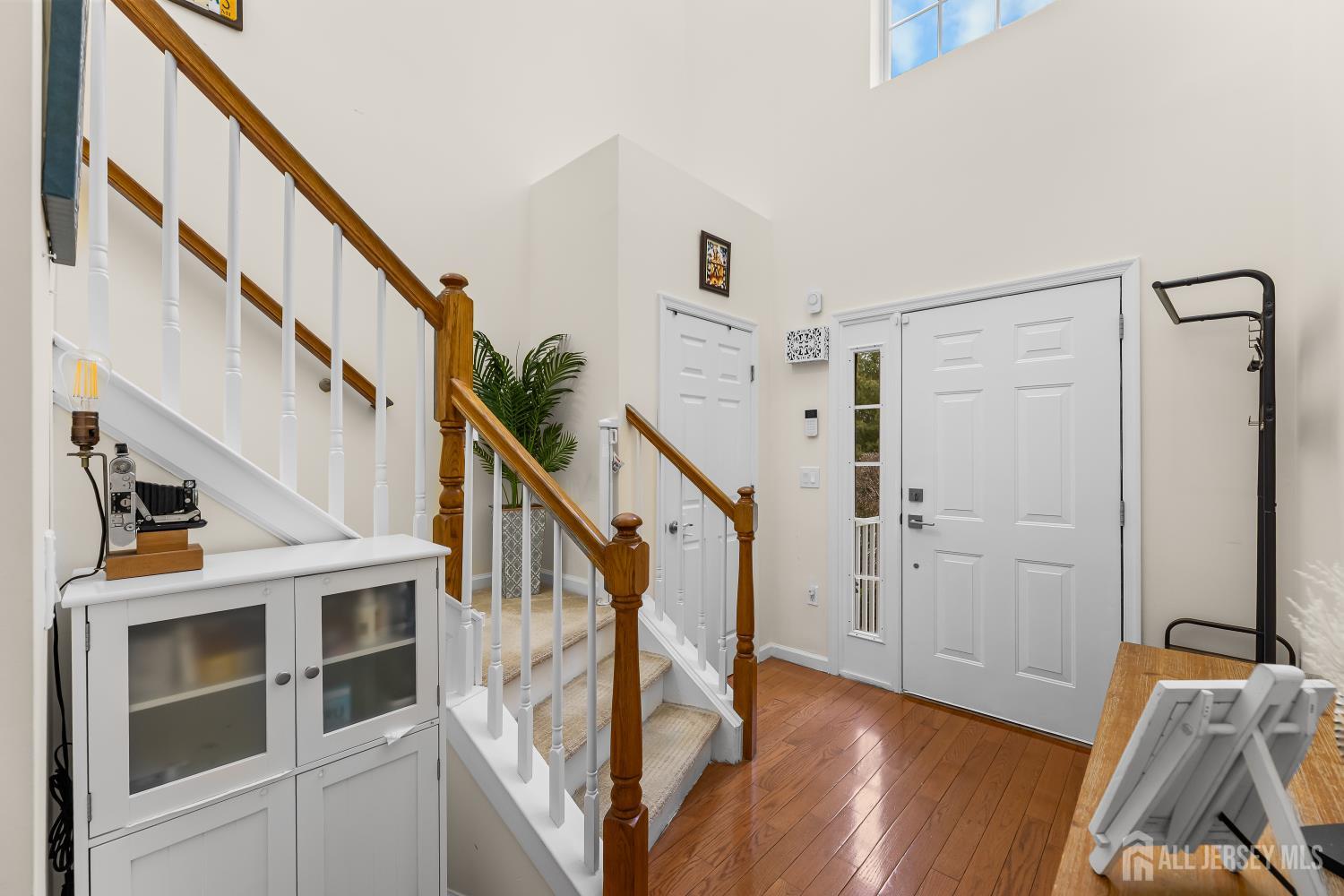 7 Edith Drive Somerset, NJ 08873 - Photo 38 of 49 a view of an entryway with wooden floor and staircase