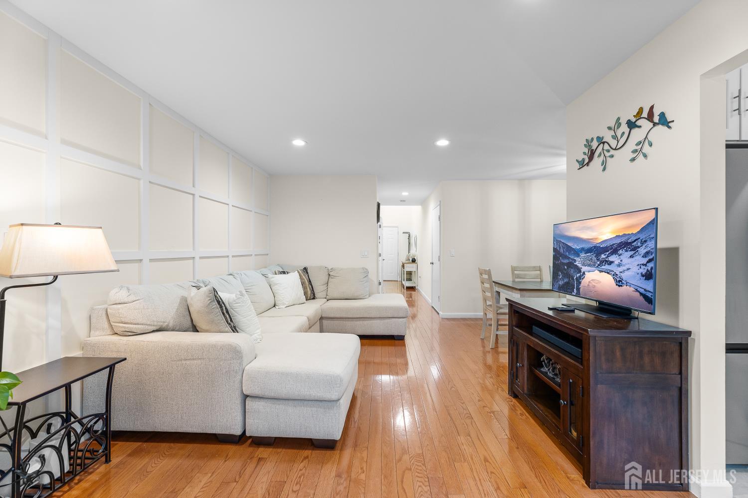 7 Edith Drive Somerset, NJ 08873 - Photo 4 of 49 a living room with furniture and wooden floor