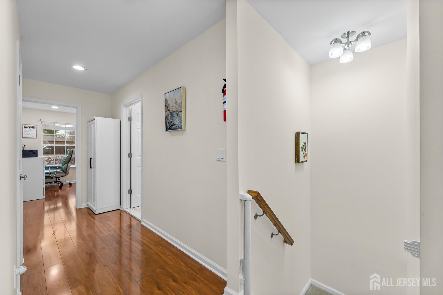 7 Edith Drive Somerset, NJ 08873 - Photo 41 of 49 a view of a hallway with wooden floor and staircase