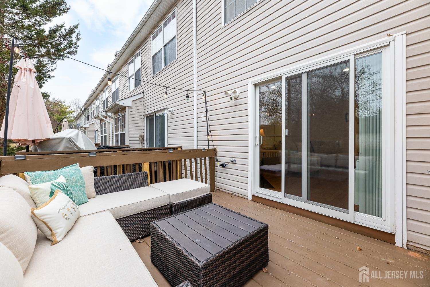 7 Edith Drive Somerset, NJ 08873 - Photo 8 of 49 a view of a patio with a table and chairs
