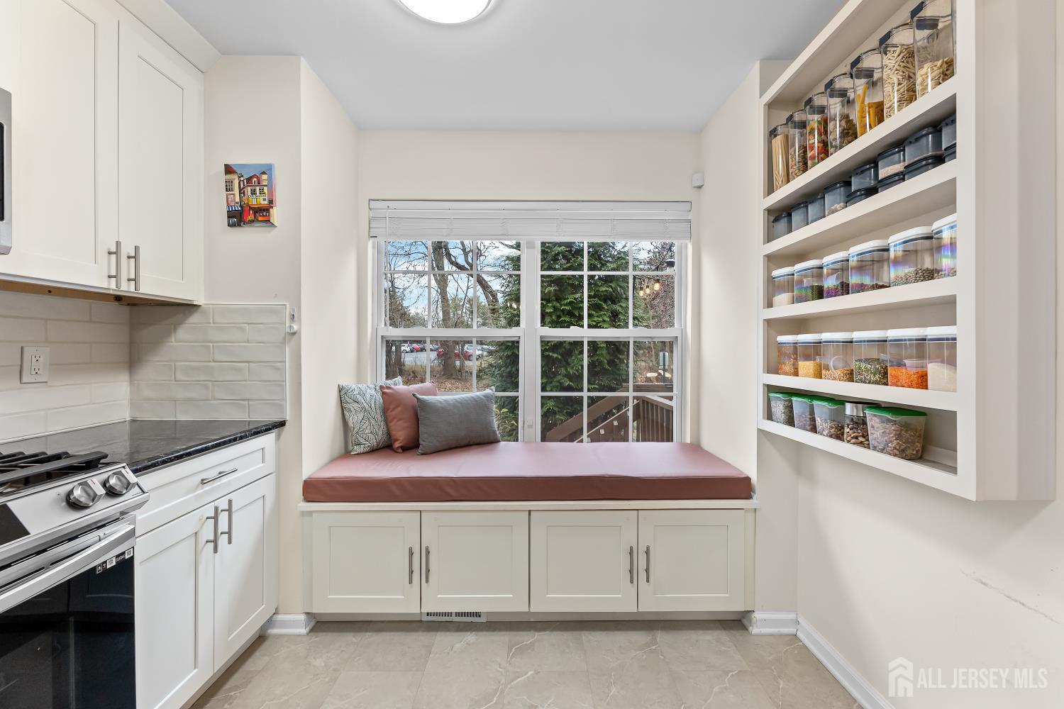 7 Edith Drive Somerset, NJ 08873 - Photo 10 of 49 a kitchen with stainless steel appliances granite countertop a stove a sink and a microwave