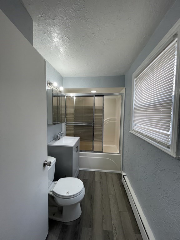 72 Longfellow Road Worcester, MA 01602 - Photo 24 of 36 a bathroom with a toilet sink and mirror