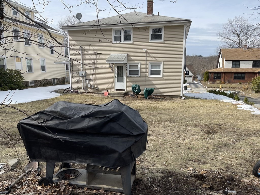 72 Longfellow Road Worcester, MA 01602 - Photo 31 of 36 a car parked in front of a house