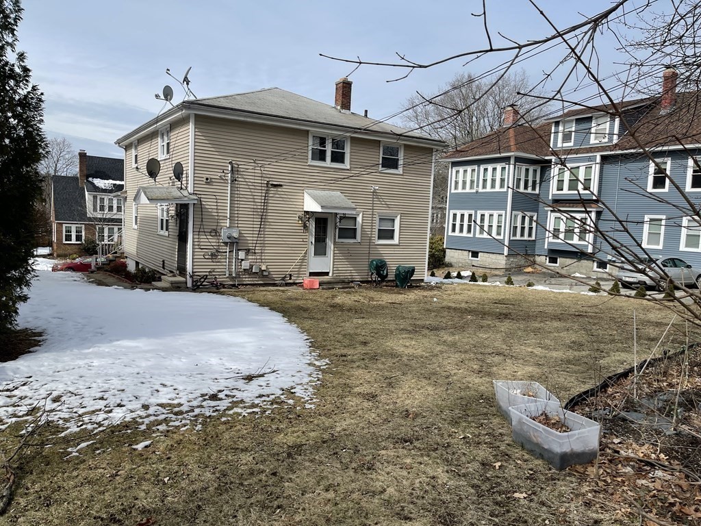 72 Longfellow Road Worcester, MA 01602 - Photo 32 of 36 a front view of a house with a yard
