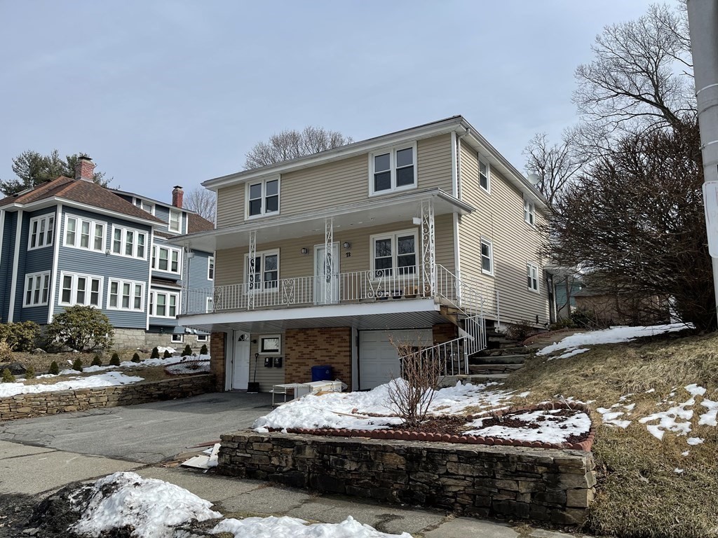 72 Longfellow Road Worcester, MA 01602 - Photo 33 of 36 a street view with couple of cars parked on road