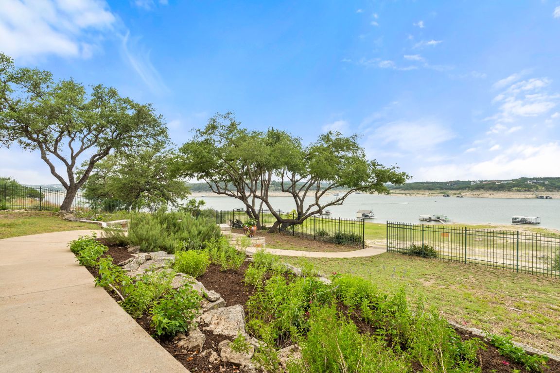 a view of an ocean with a house in the background