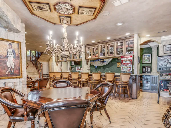 a kitchen with stainless steel appliances granite countertop a stove and cabinets