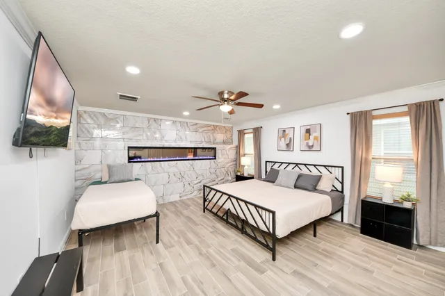 a bathroom with a bathtub and a shower