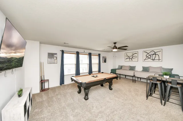 a room with furniture and window