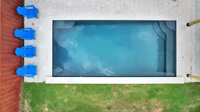 a work room with furniture and a wooden floor