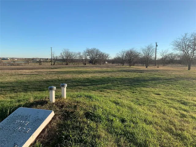 a view of balcony with wooden floor