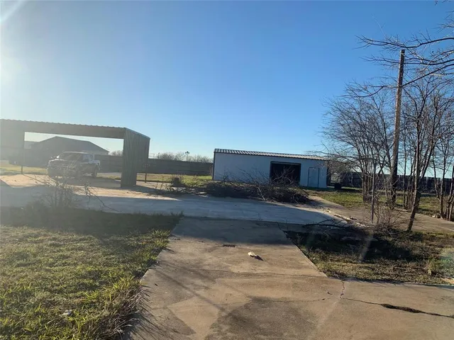 a view of a lake with a big yard