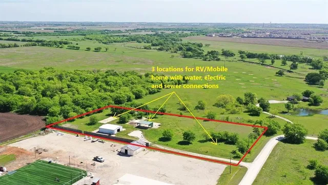 a view of a garden with an outdoor space