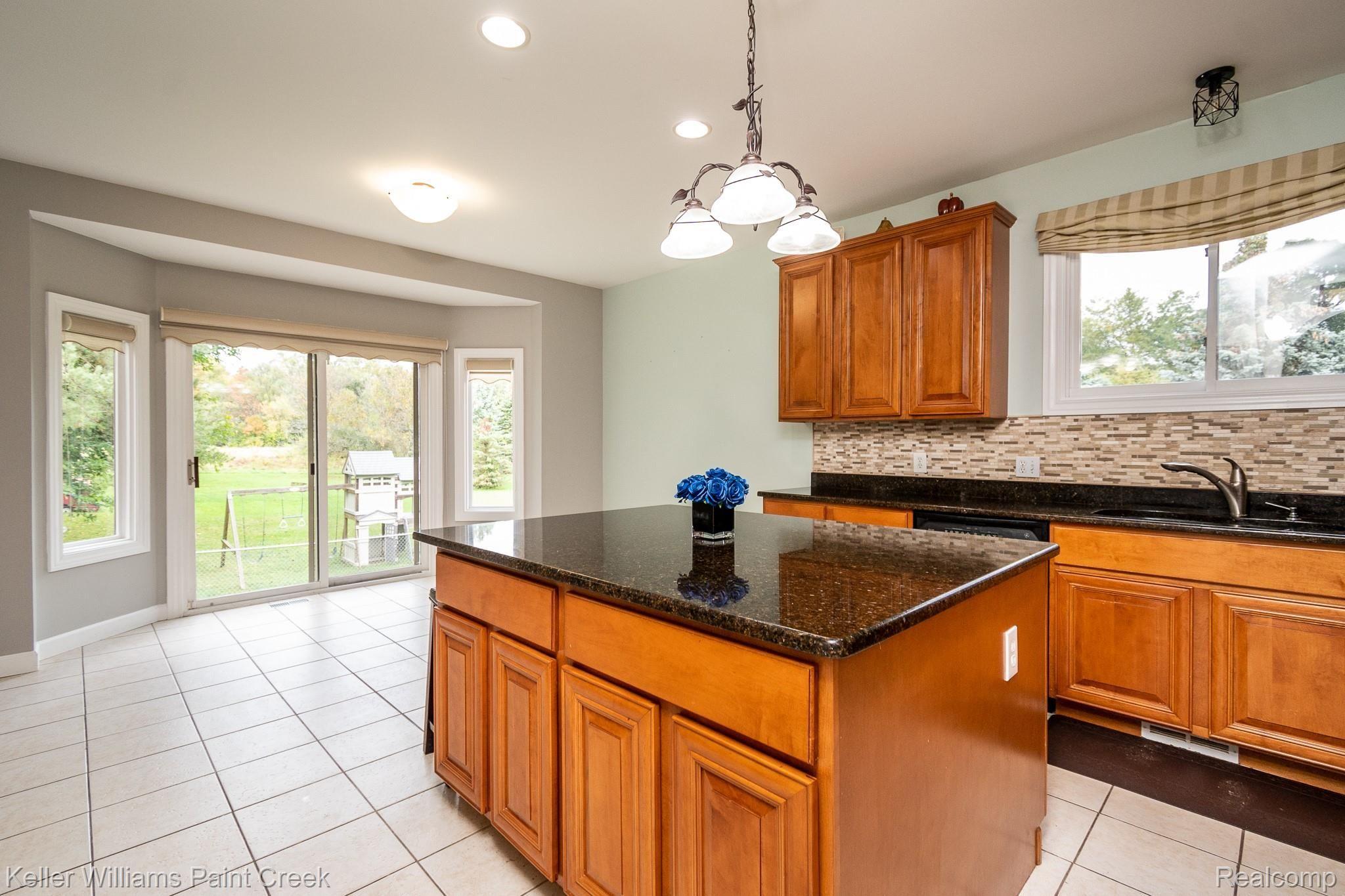 3307 Hazelton Avenue Rochester, MI 48307 - Photo 14 of 41 Kitchen with doorway to backyard entertaining area