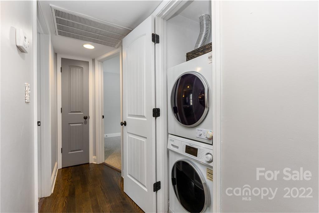 4915 Park Road, Unit C Charlotte, NC 28209 - Photo 15 of 22 a view of a hallway with washer and dryer