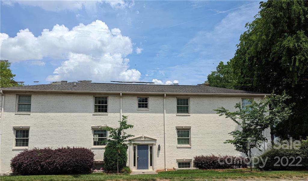 4915 Park Road, Unit C Charlotte, NC 28209 - Photo 22 of 22 a front view of a house with a garden