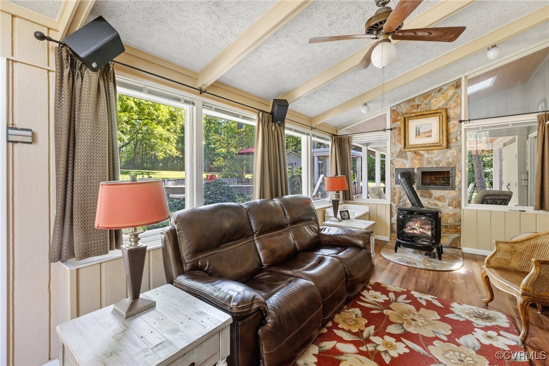 281 Echo Meadows Road Rockville, VA 23146 - Photo 14 of 50 a living room with furniture and a fireplace