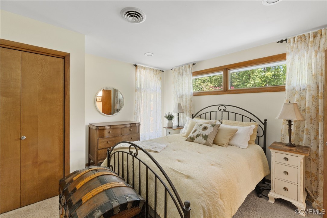 281 Echo Meadows Road Rockville, VA 23146 - Photo 22 of 50 a bedroom with a bed and a window