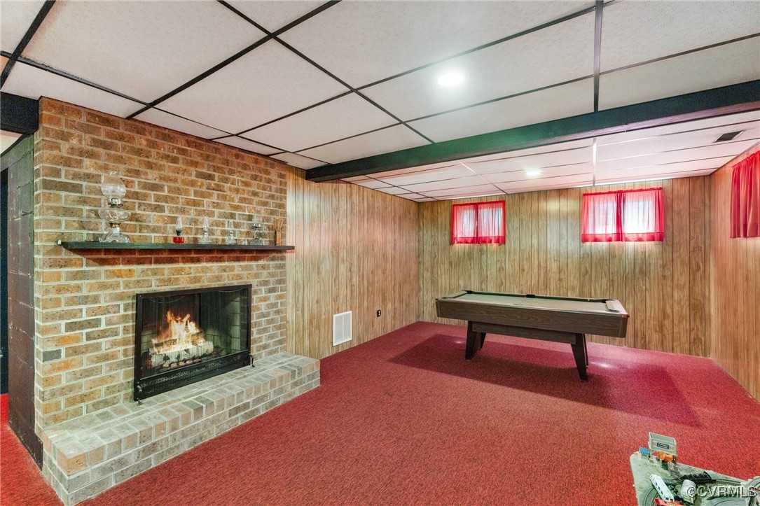 281 Echo Meadows Road Rockville, VA 23146 - Photo 23 of 50 a room with furniture and a fireplace