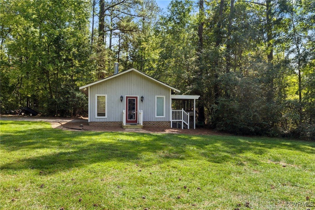 281 Echo Meadows Road Rockville, VA 23146 - Photo 36 of 50 a view of a house with a yard and sitting area