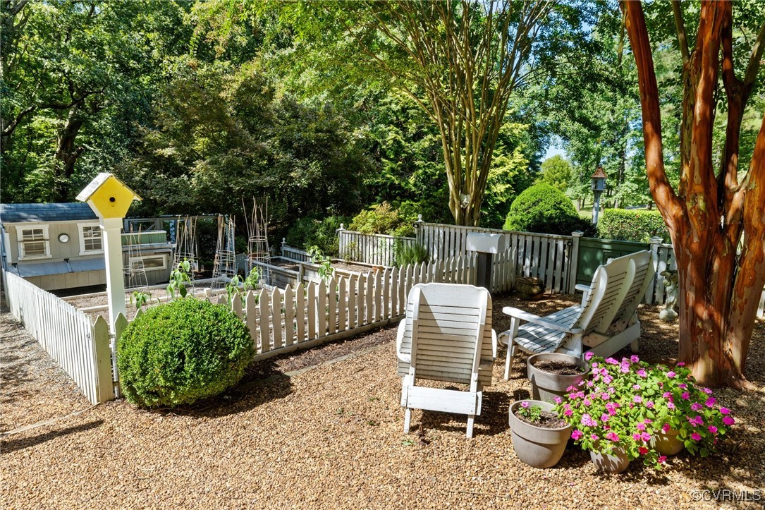 281 Echo Meadows Road Rockville, VA 23146 - Photo 38 of 50 a view of a chair and table in the backyard