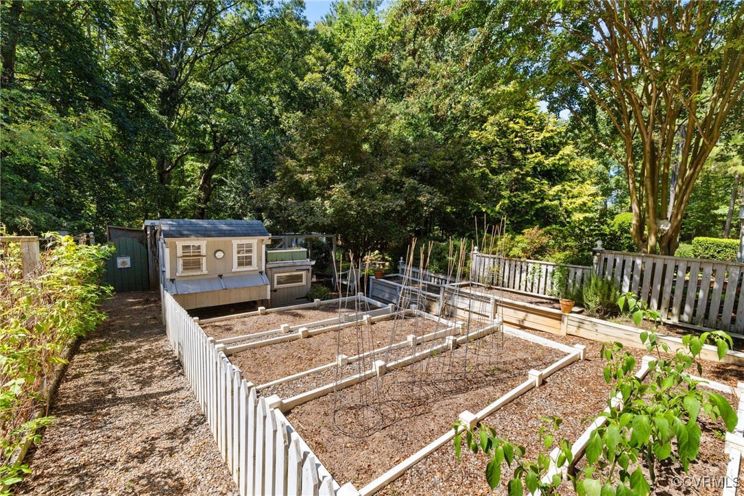 281 Echo Meadows Road Rockville, VA 23146 - Photo 42 of 50 a view of a chairs and table in the backyard