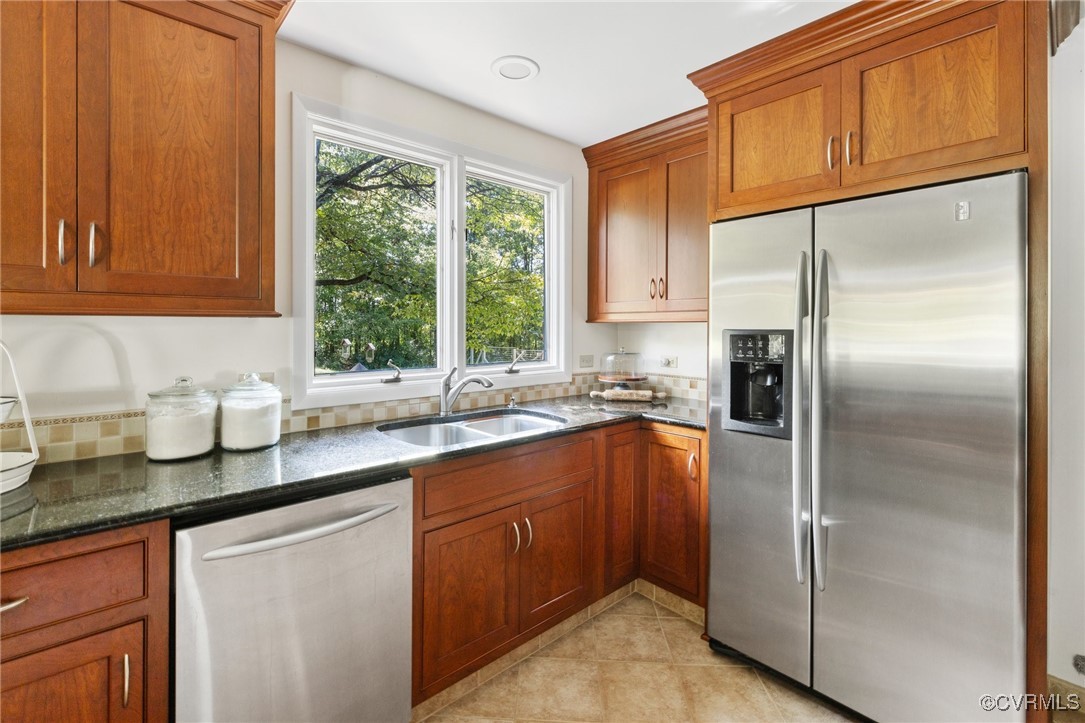 281 Echo Meadows Road Rockville, VA 23146 - Photo 10 of 50 a kitchen with stainless steel appliances granite countertop a refrigerator sink and cabinets