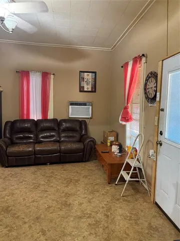 a room with furniture and a window