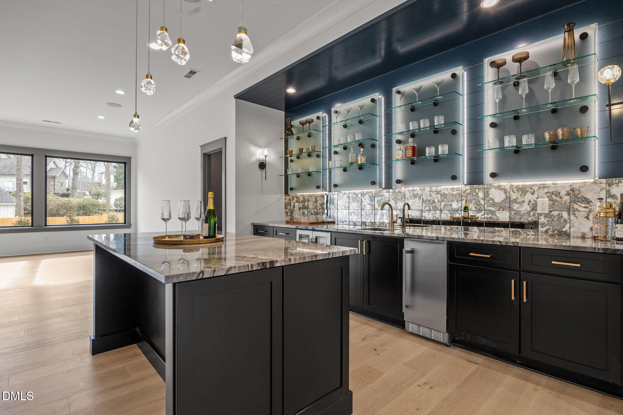 1312 Hunting Ridge Road Raleigh, NC 27615 - Photo 30 of 52 a kitchen with stainless steel appliances granite countertop a sink counter space and a large window