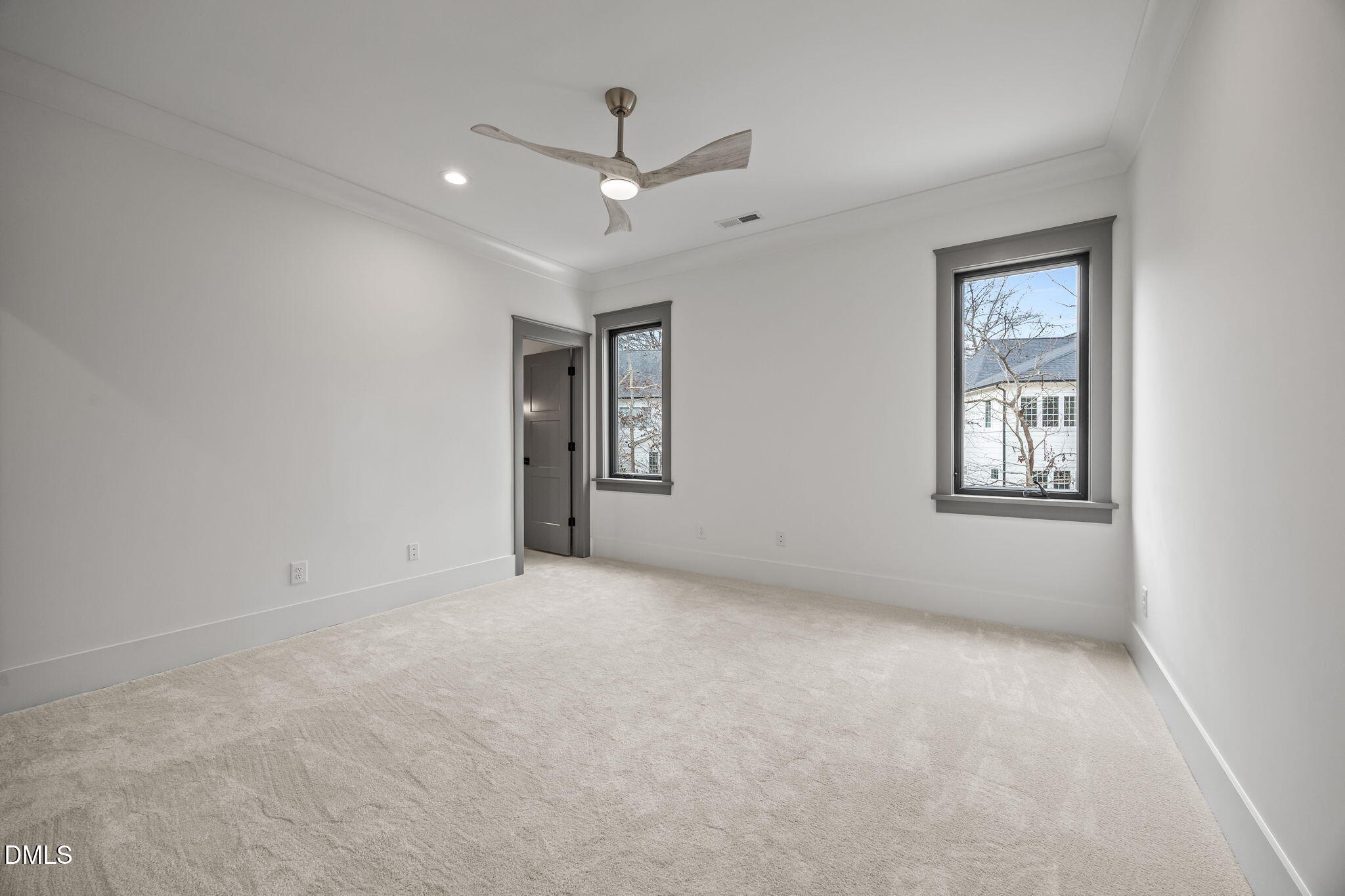 1312 Hunting Ridge Road Raleigh, NC 27615 - Photo 41 of 52 a view of an empty room with a window