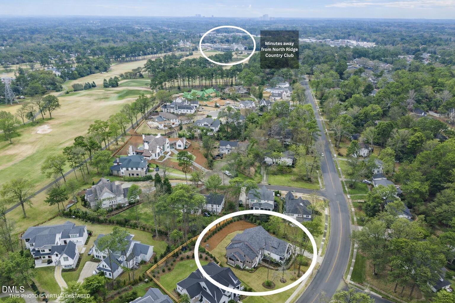 1312 Hunting Ridge Road Raleigh, NC 27615 - Photo 52 of 52 an aerial view of a house with a yard and lake view