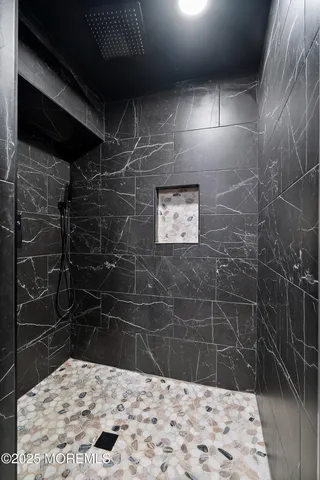 an aerial view of a house with a garden