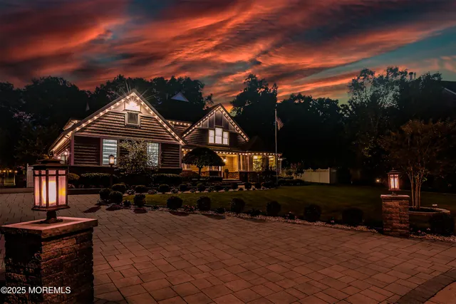 a view of yard with swimming pool and sitting area