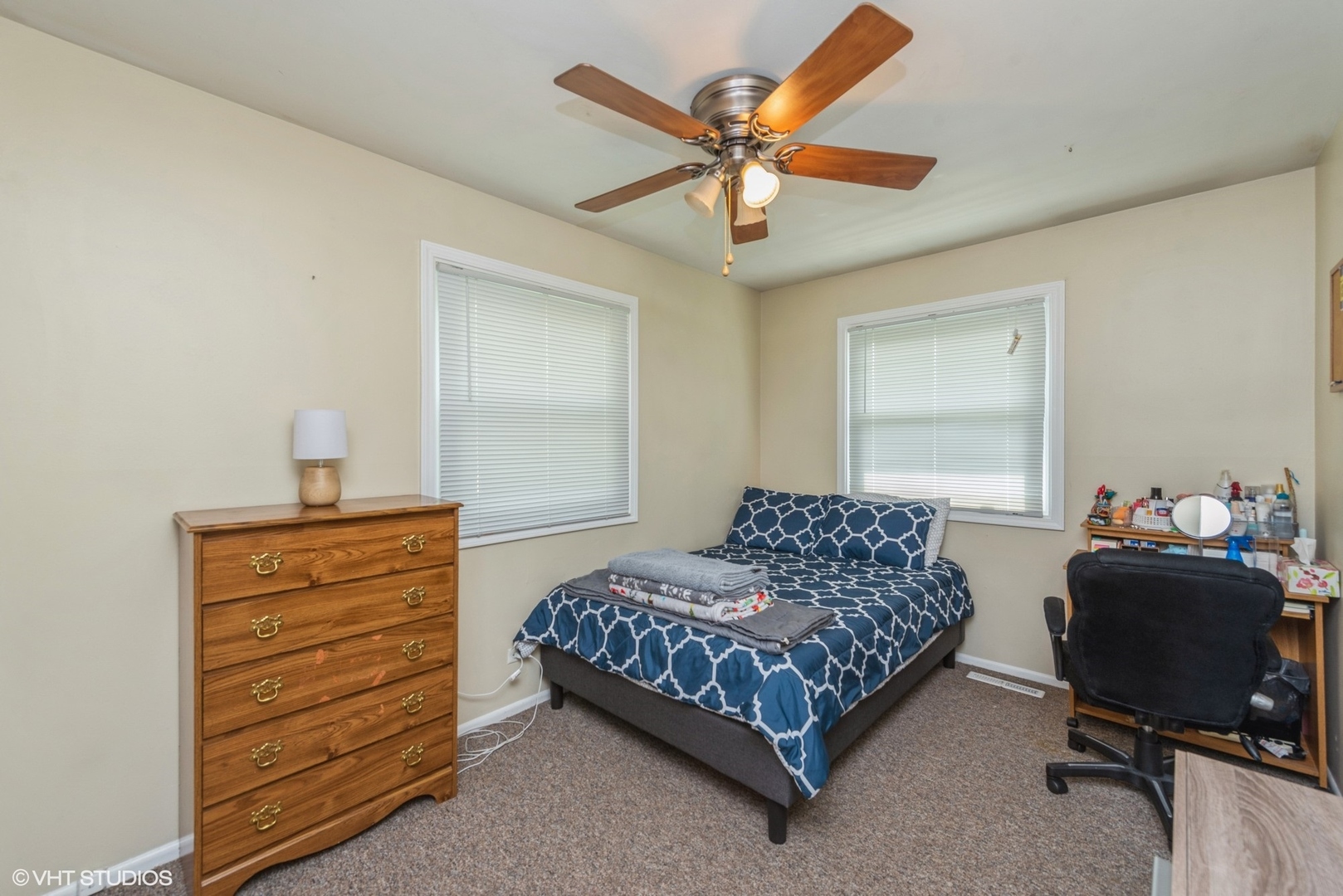 18524 West Geier Road Gurnee, IL 60031 - Photo 4 of 10 a bedroom with a bed and a chair