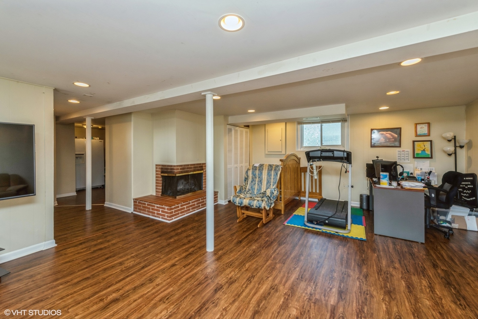 18524 West Geier Road Gurnee, IL 60031 - Photo 7 of 10 a view of a livingroom with furniture and a flat screen tv