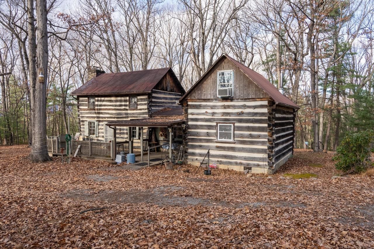 800 Cove Mountain Road Mathias, WV 26812 - Photo 60 of 74 a view of a house with a yard and wooden fence
