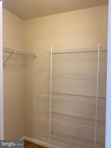 a bathroom with a tub and shower