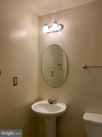 a view of a house with a yard and a large window