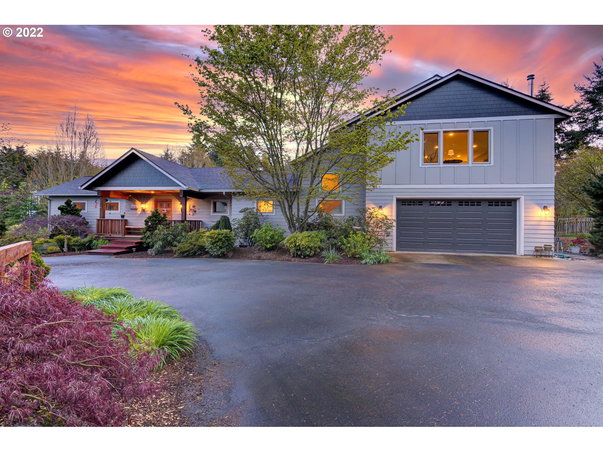 19601 Northeast 42nd Court Ridgefield, WA 98642 - Photo 1 of 32 a front view of a house with a yard and garage