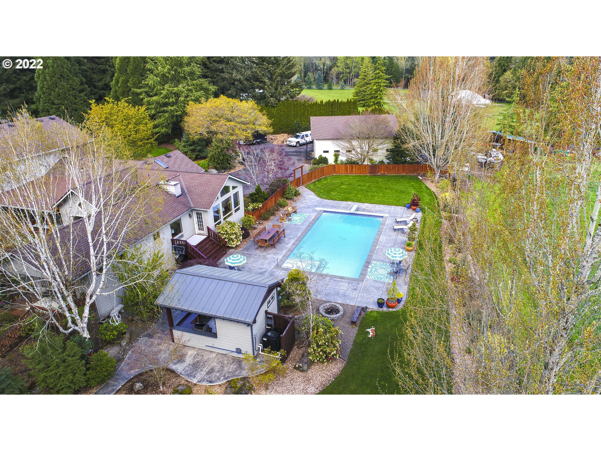19601 Northeast 42nd Court Ridgefield, WA 98642 - Photo 2 of 32 a aerial view of a house with a swimming pool