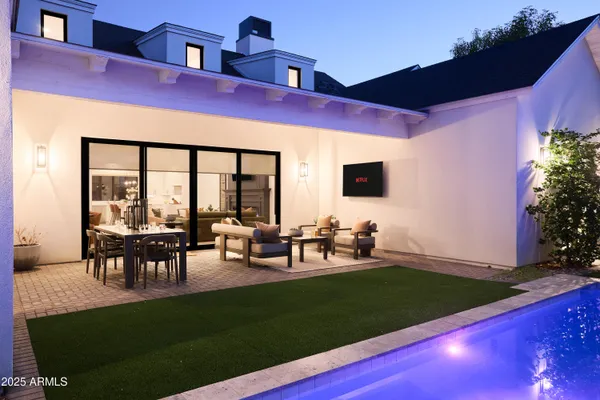 a view of an chairs in front of house