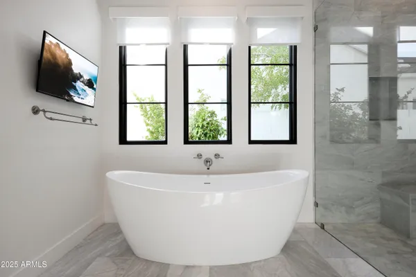 a utility room with sink dryer and washer