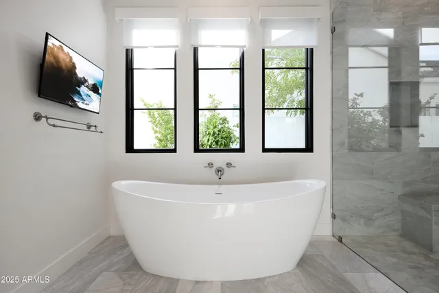 a utility room with sink dryer and washer