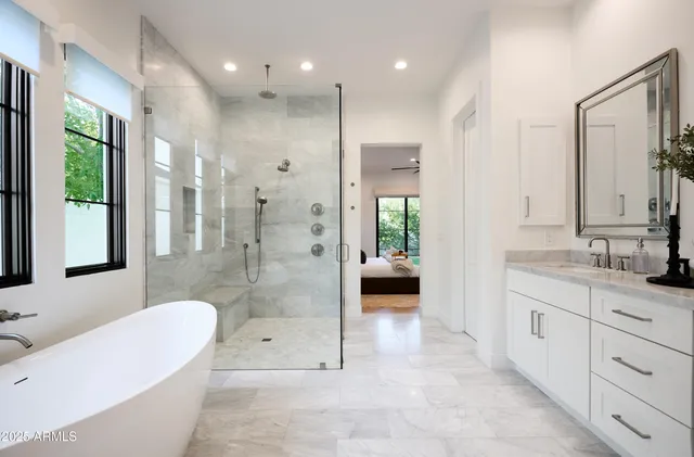 a view of swimming pool with seating space