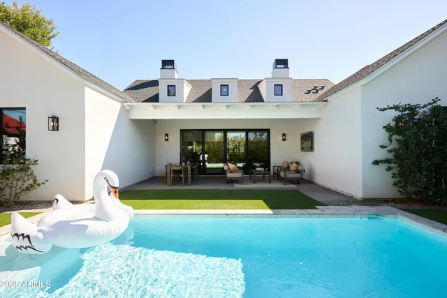 a outdoor dining space with furniture and outdoor view