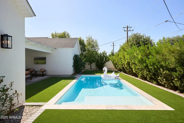a view of an chairs in front of house