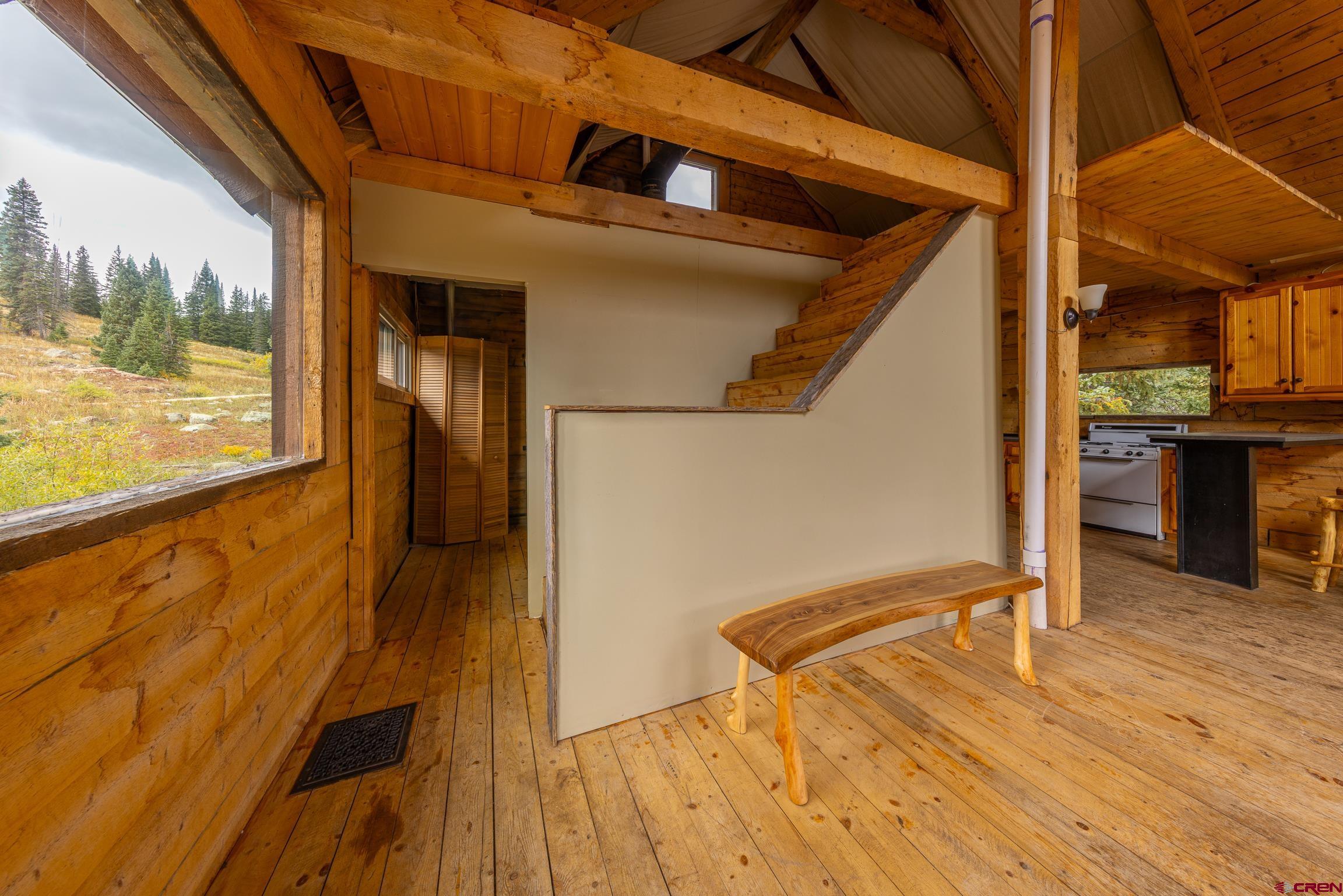 824 County Road Crested Butte, CO 81224 - Photo 17 of 39 a view of a balcony with wooden floor