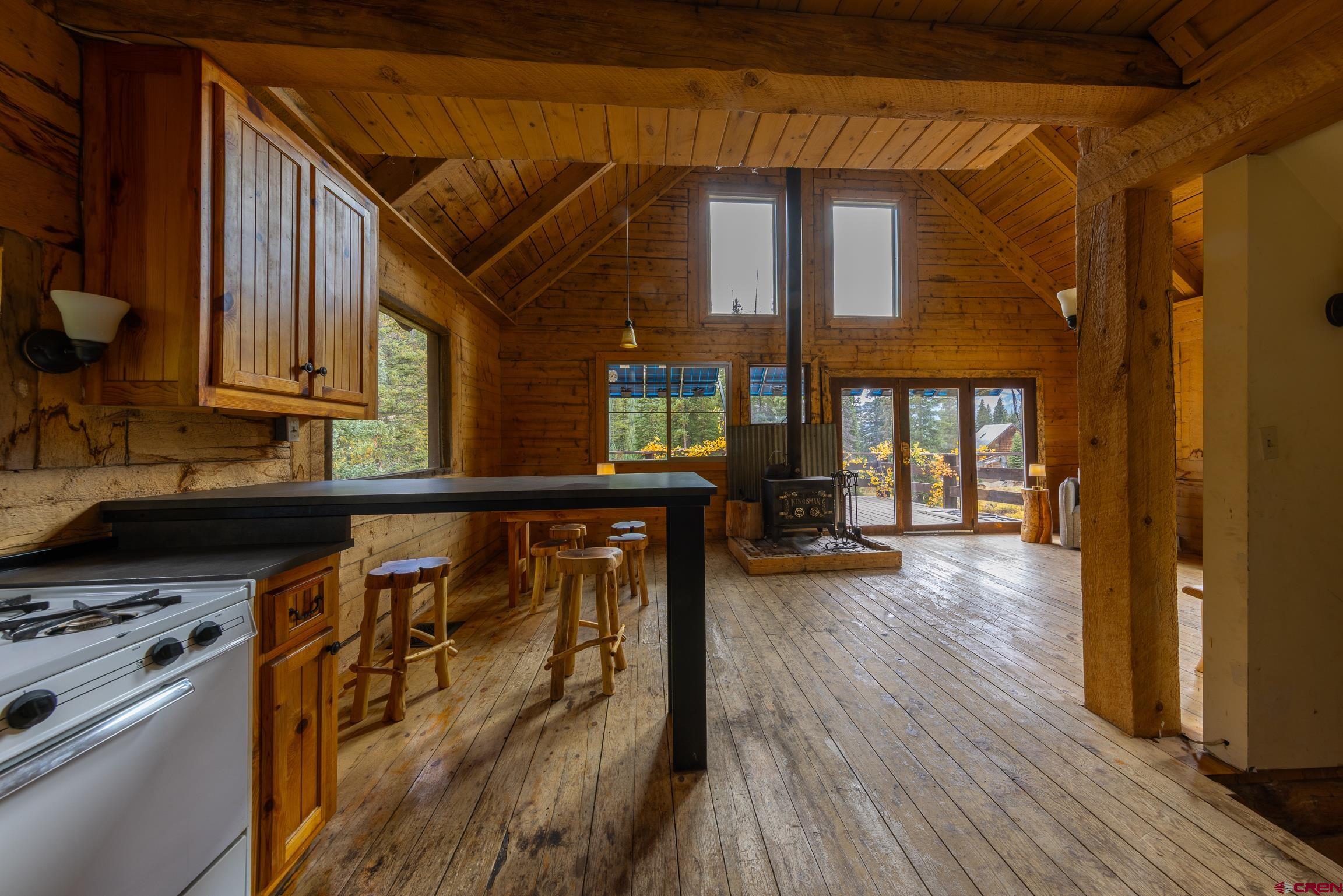 824 County Road Crested Butte, CO 81224 - Photo 24 of 39 a view of a livingroom with furniture and hardwood floor